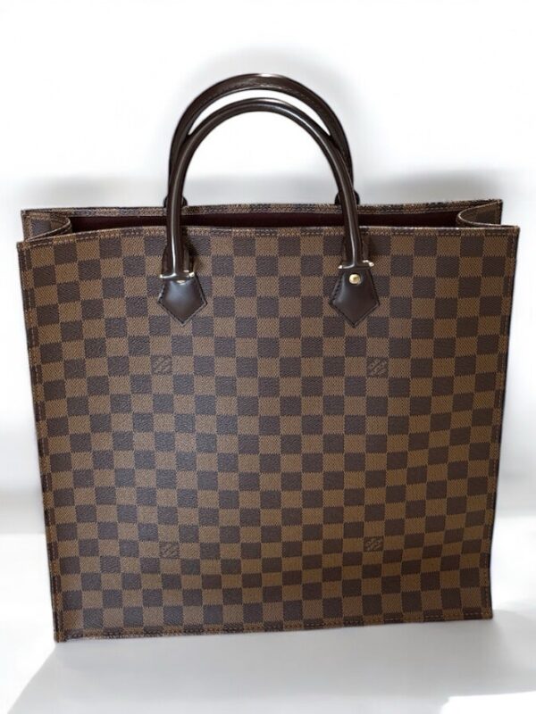 Sac plat Louis Vuitton
