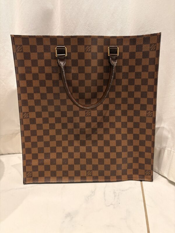 Sac plat Louis Vuitton